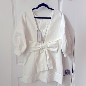 (NEW) never worn. Sasha Bow Back Mini